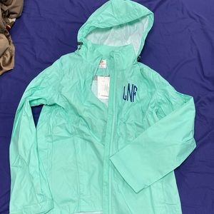 Women’s raincoat size Medium monogrammed with LNF